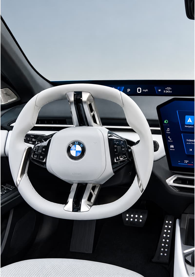 Close up of BMW i3 Central display and steering wheel.