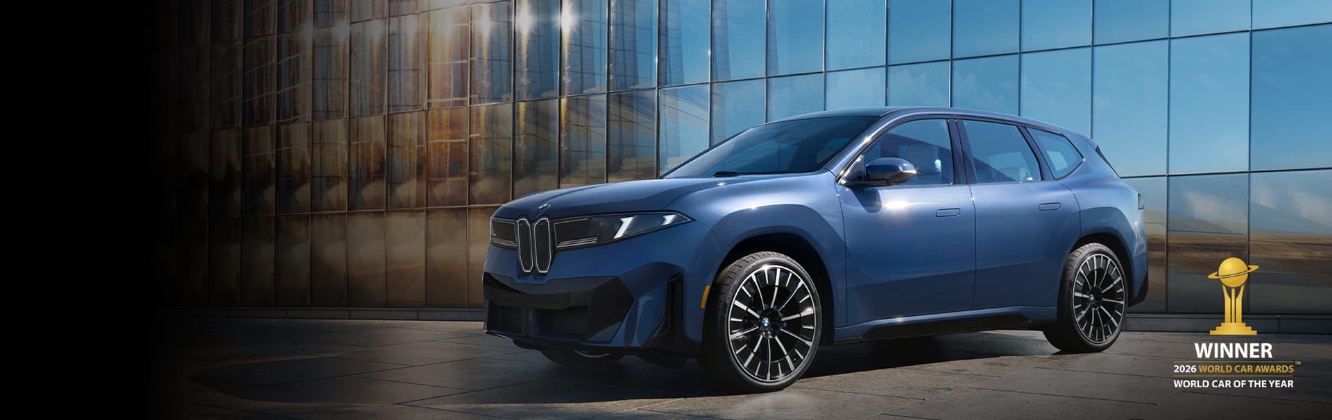 The BMW iX3 SUV parked. Click to learn more.
