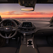 Driver's View of the 2025 CT4 Sleek Infotainment System and  Steering Wheel