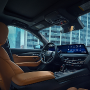 2025 Cadillac CT5 Interior passenger seat view of windshield with buildings in the background.