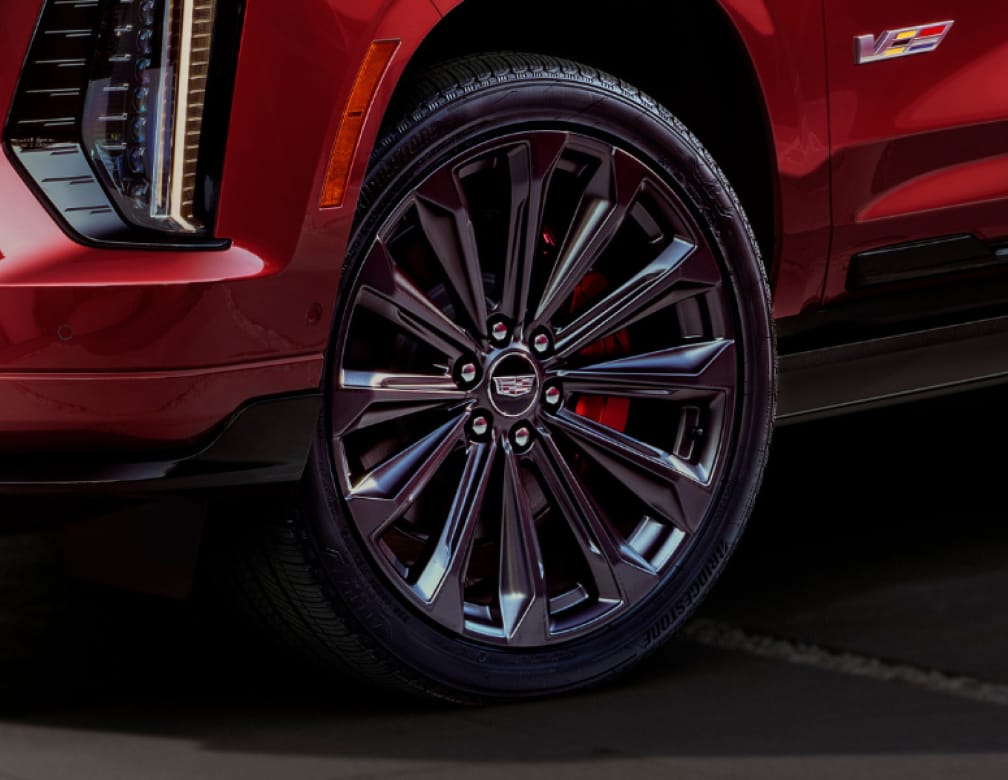 The 24-inch Wheels on a Red 2025 Cadillac Escalade