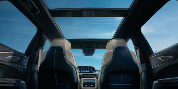 Back Seat View of the 2025 Cadillac LYRIQ Front Row and Panoramic Sunroof