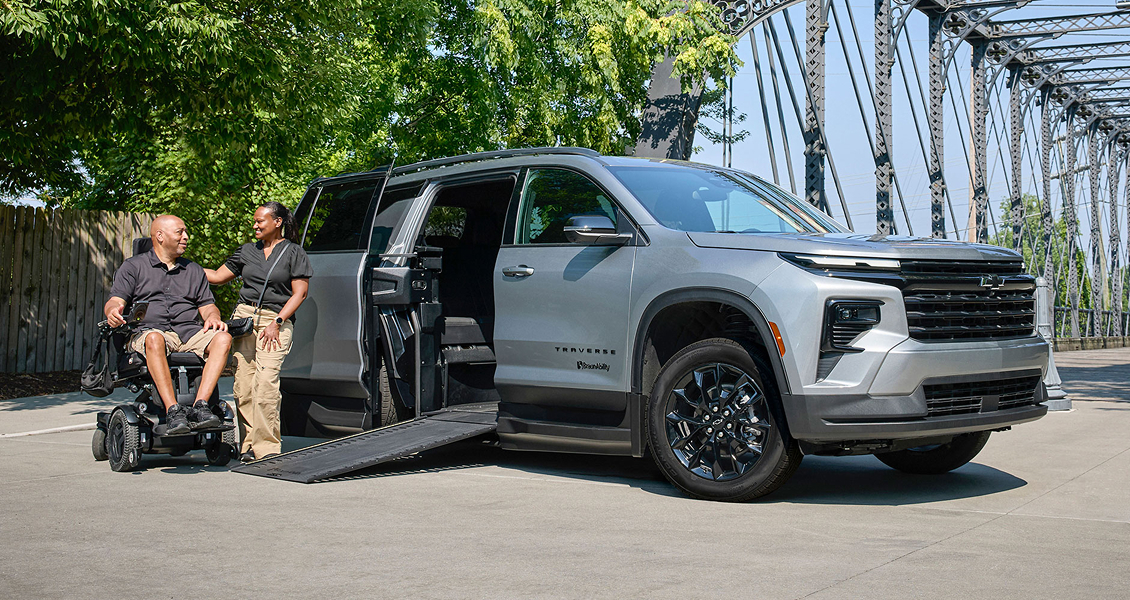 Chevy parked with accessibility ramp down