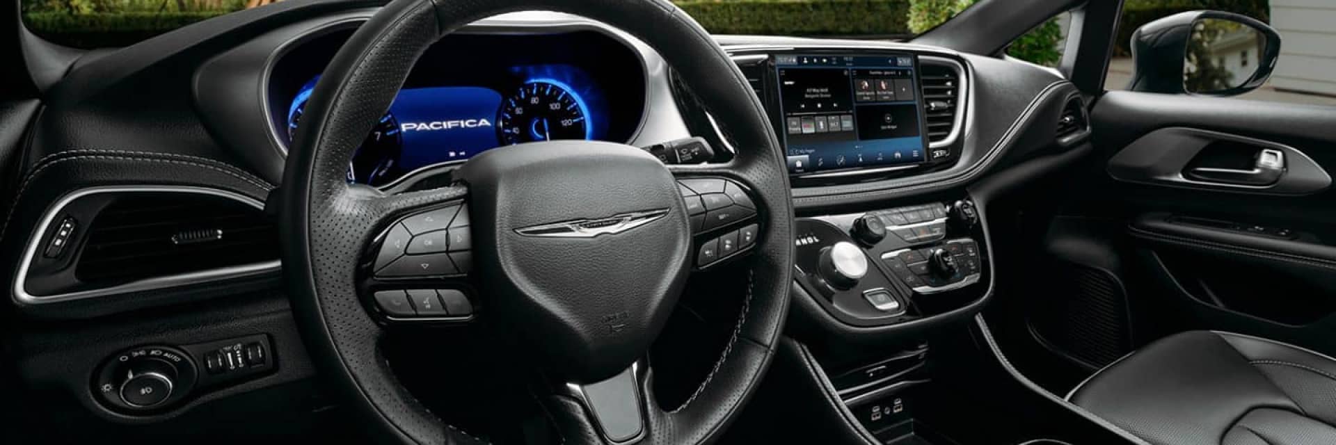 Interior of a Chrysler Pacifica steering wheel and front cabin