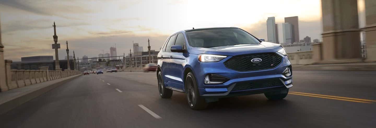 A Ford Bronco Edge ST driving on a road.