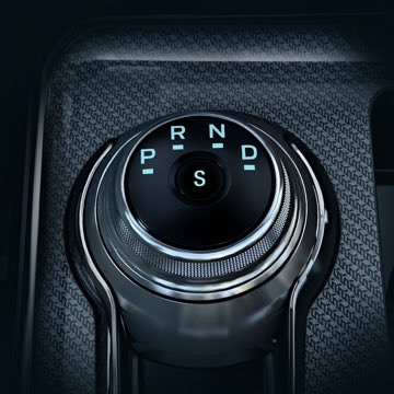 A close up of the gear shift