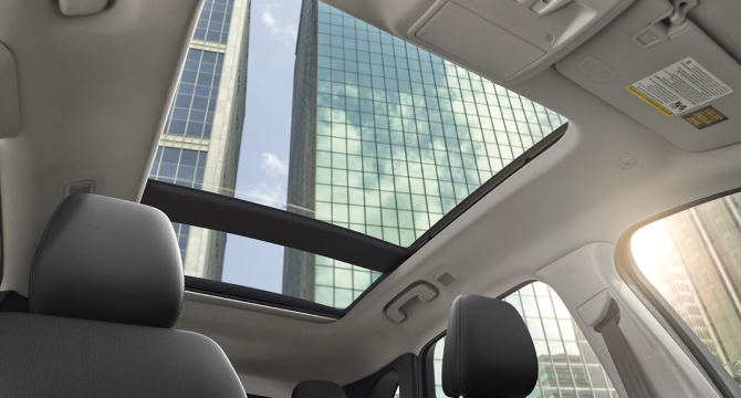 An interior shot looking up through the sunroof of a Ford Escape