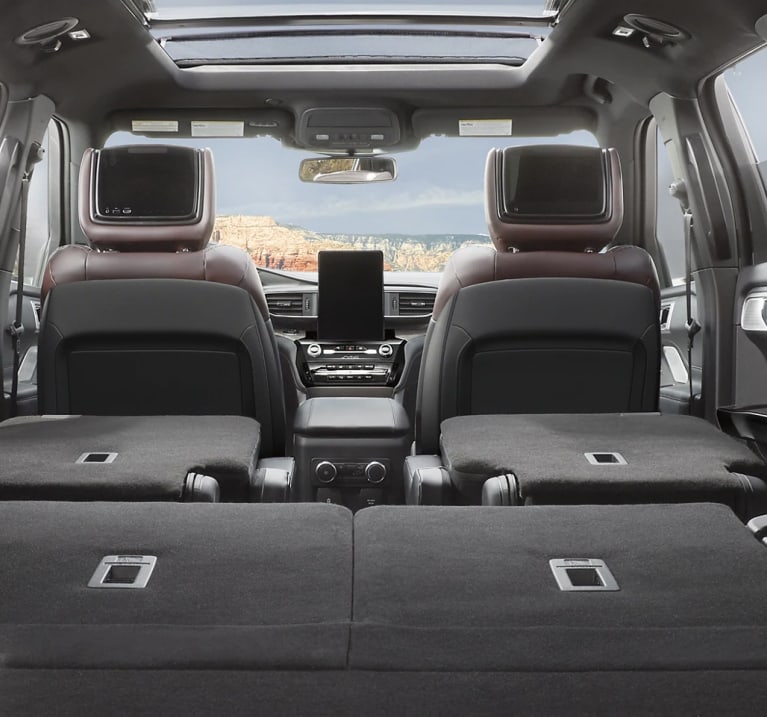 Interior shot of Ford Explorer back seats folded down