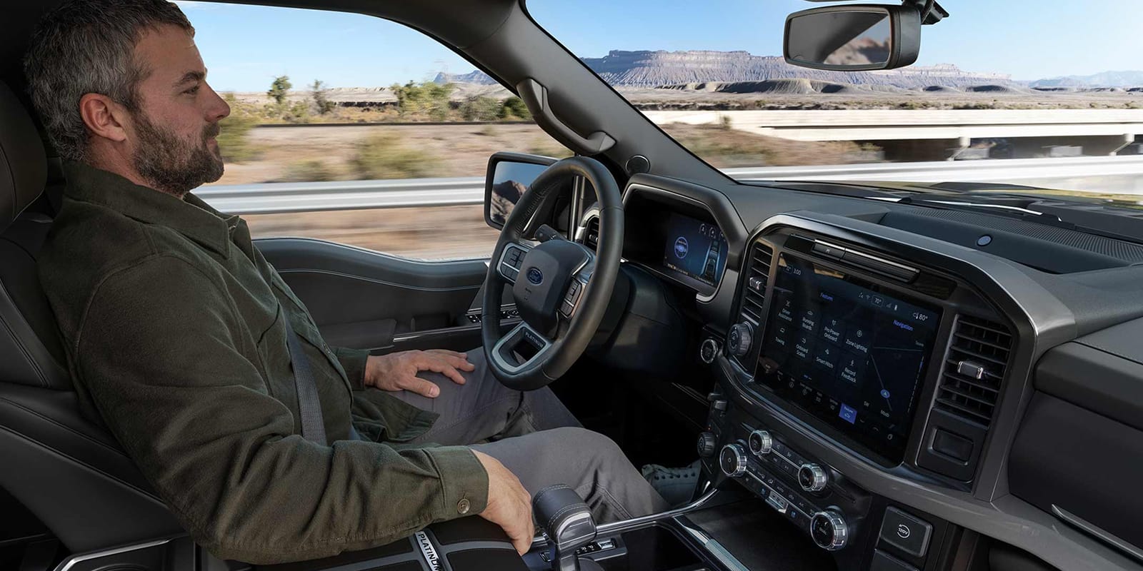 Man using the Ford BlueCruise hands-free driving feature on a 2025 Ford F-150® pickup