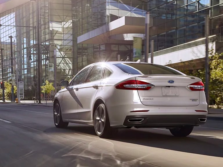 Rear view of white 2020 Ford Fusion