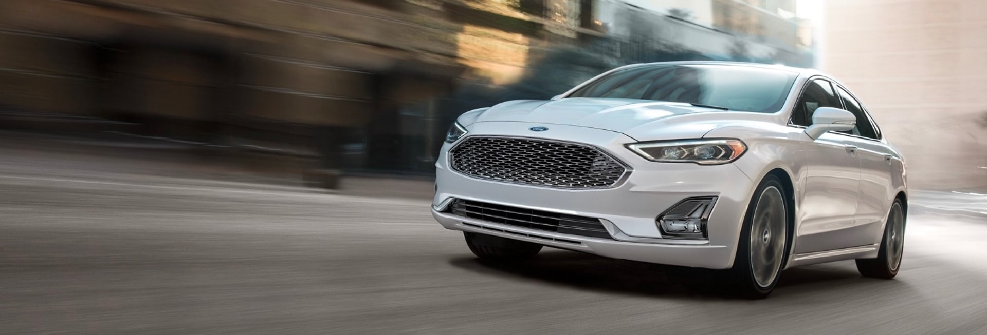2020 Ford Fusion driving on a city street