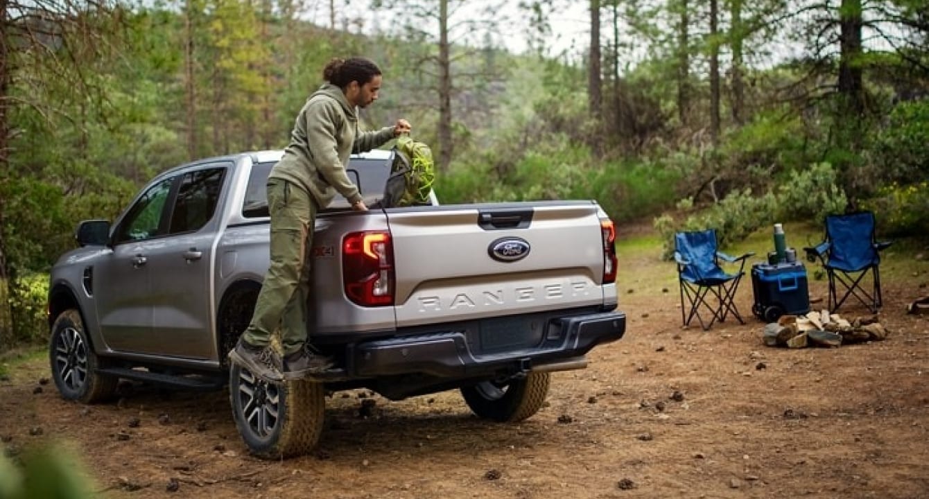 2024 Ford Ranger parked at a forest campsite