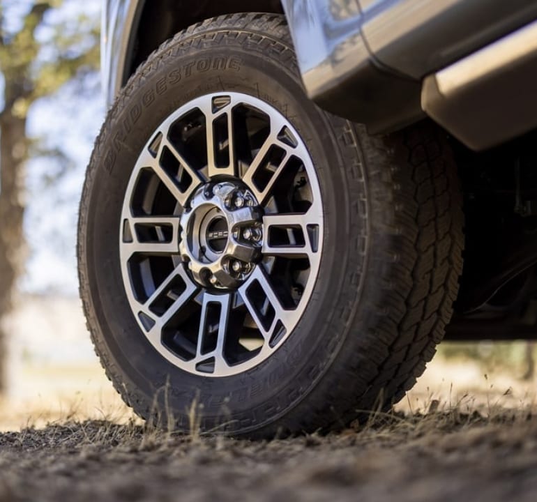 closeup of a front wheel of a Ford Super Duty Limited