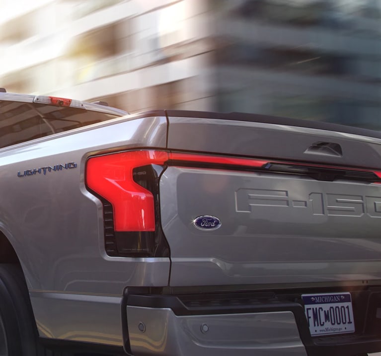 A back-end view of a Ford F-150 Lightning truck.