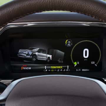 Ford F-150 driver-side dashboard behind the steering wheel.