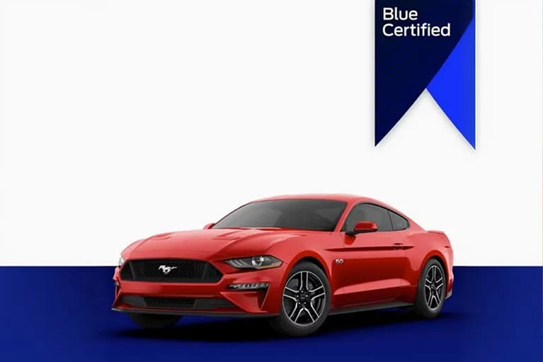 Red Ford Mustang coupe with a Blue Certified badge on a white and blue background.