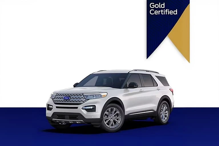 White Ford Explorer with a Gold Certified badge on a white and blue background.