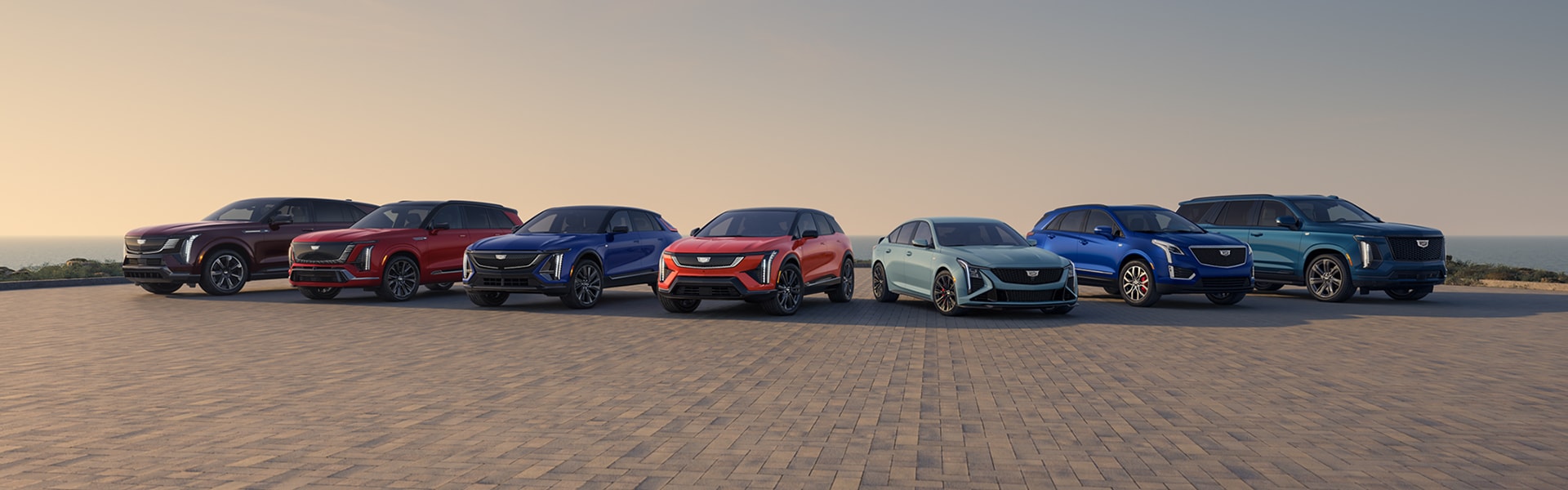 Pack shot of Cadillac vehicles parked on brick pavers