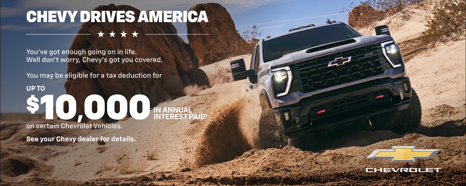 Chevrolet pickup truck driving offroad in the desert