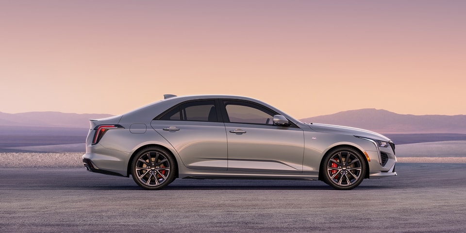Side Profile View of a Silver 2026 CT4 Parked in the Open Desert