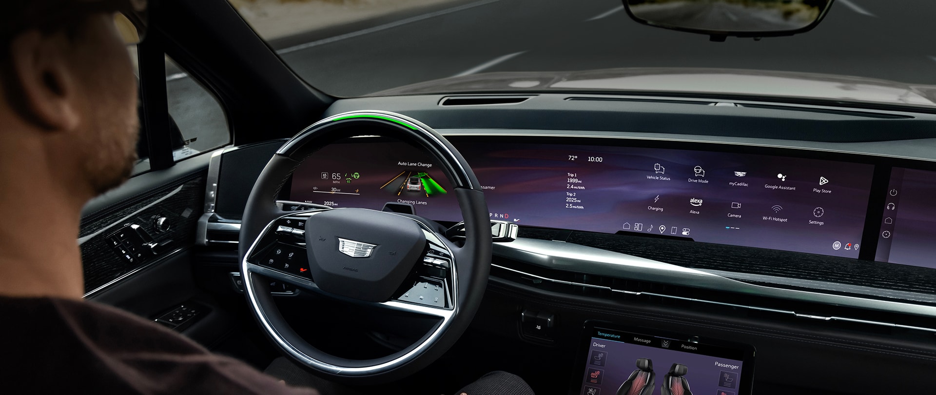 over the shoulder view of a driver using Super Cruise hands free driving