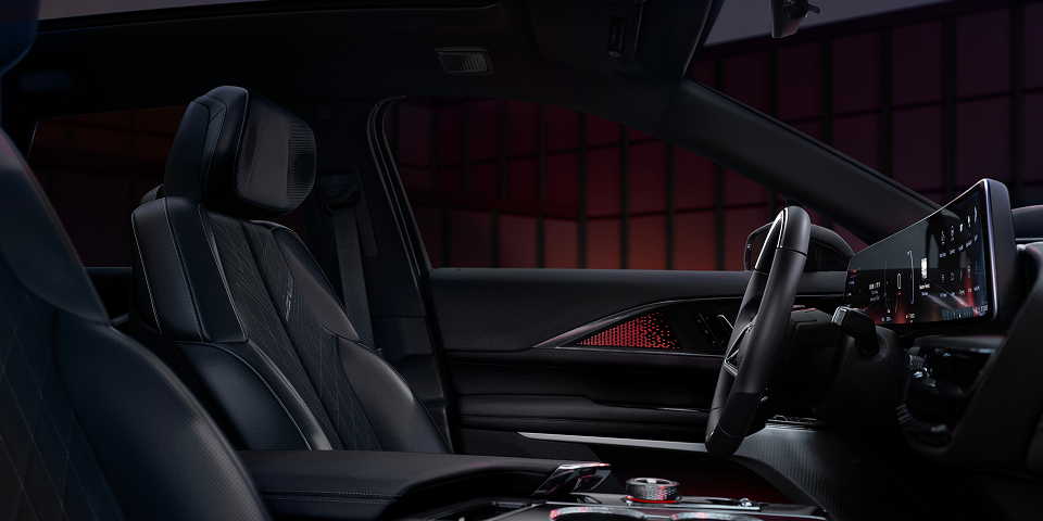 Interior shot showing the driver and passenger sides and dashboard/steering column