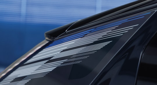 Close-up of the Modern Pattern on the 2026 OPTIQ-V Rear Quarter Glass