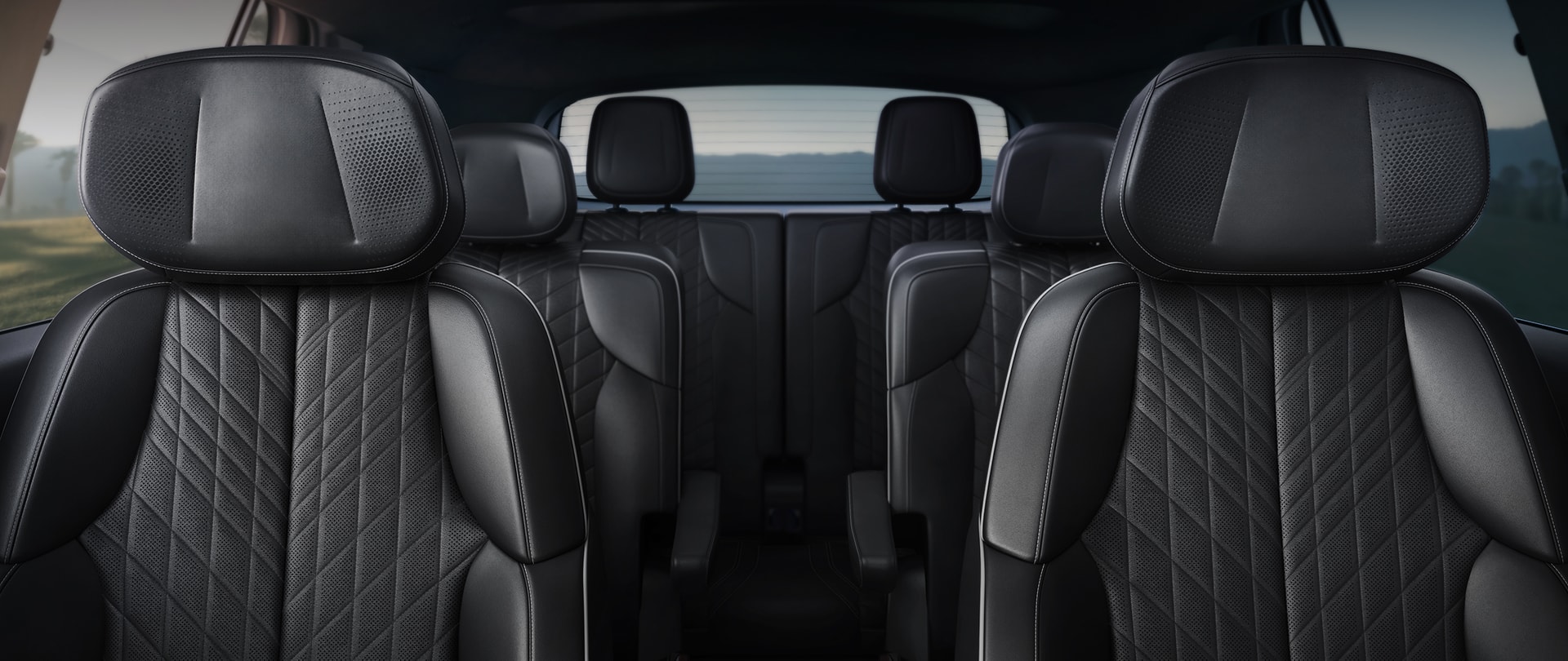 Dashboard View of the 2027 Cadillac VISTIQ's Three Rows of All-black Seating