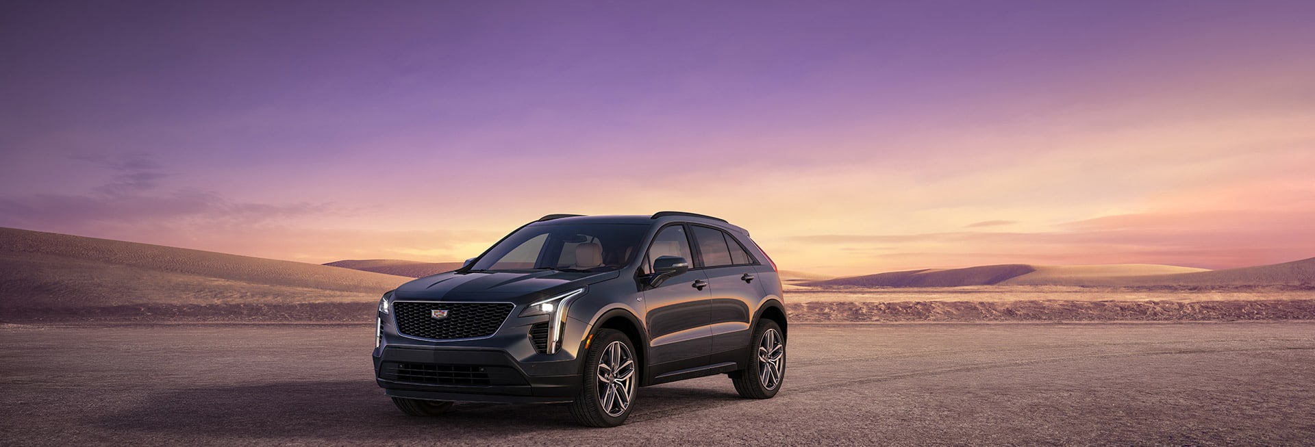 2023 Cadillac XT4 parked in the desert at sunset