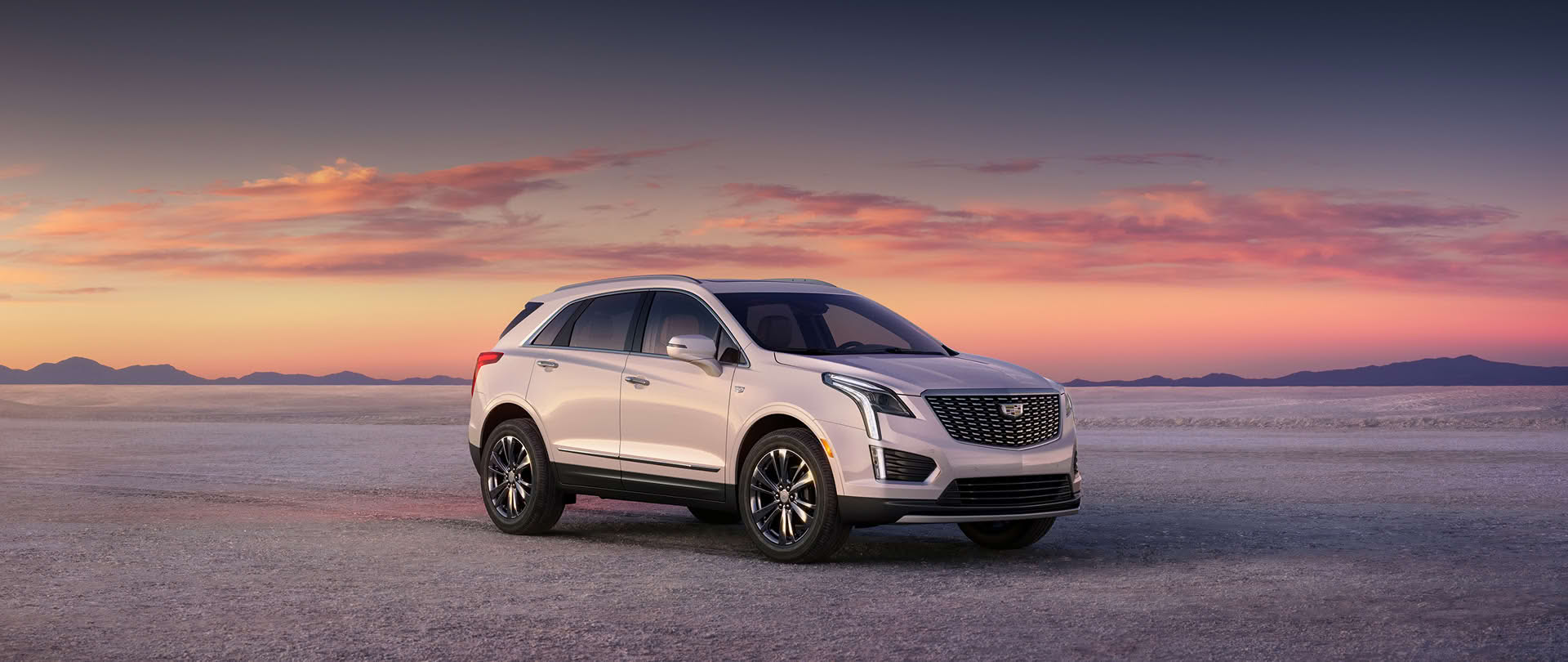 The 2026 Cadillac XT5 Parked with a Beautiful Sunset in the Background