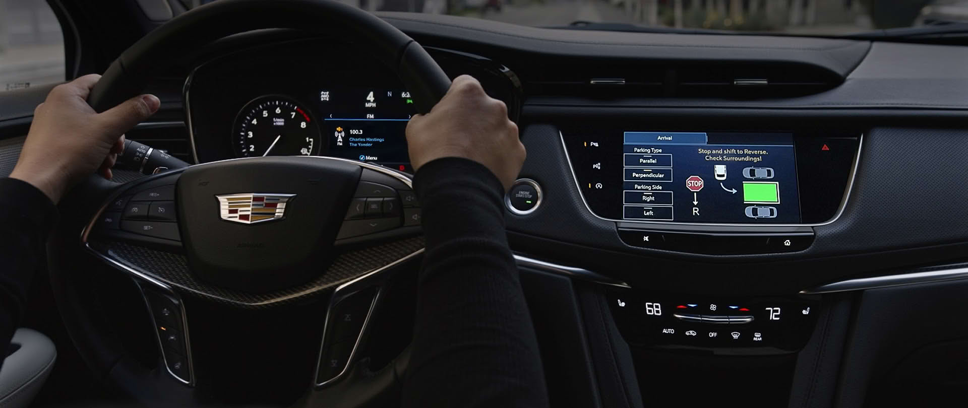 Close-up of a Man Utilizing the Automatic Parking Assist Technology of the 2026 Cadillac XT5