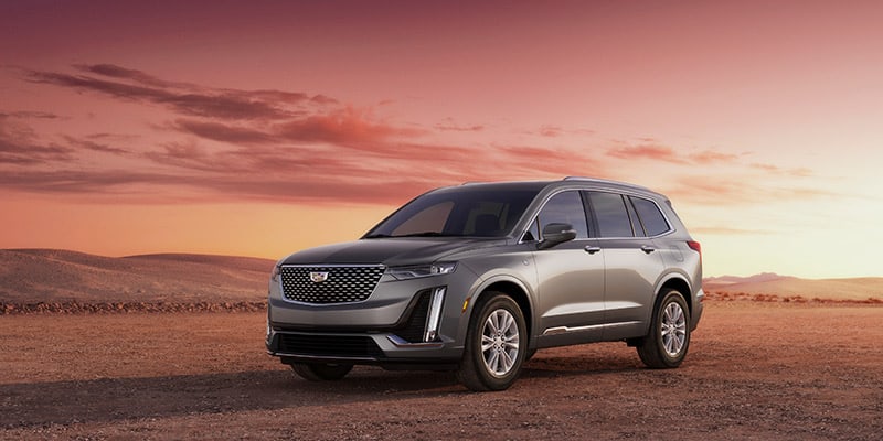 2023 Cadillac XT6 parked in the desert at sunset
