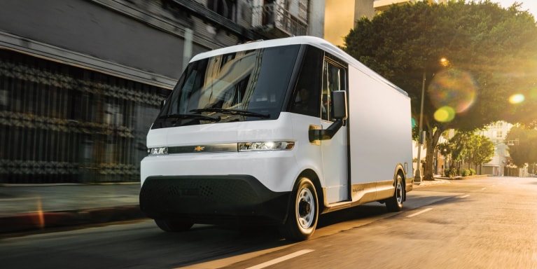 2025 BrightDrop van driving on a city street