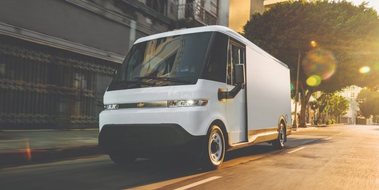 2025 BrightDrop van driving on a city street