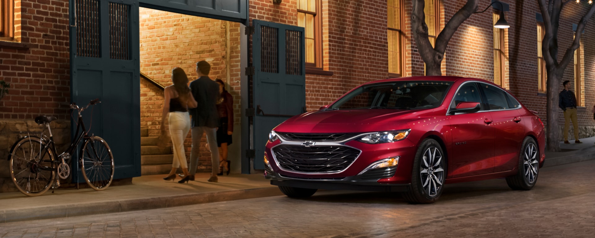 2025 Chevy Malibu parked on a cobblestone street