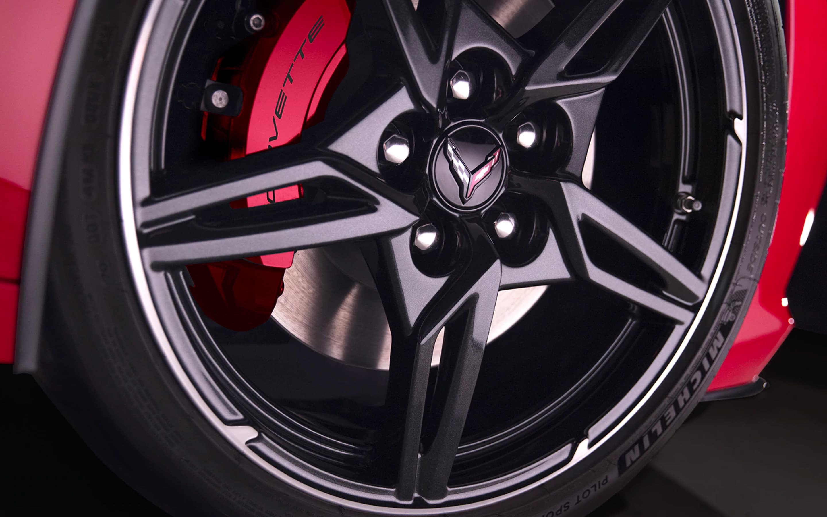 A golf bag inside the Corvette's trunk