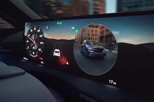 Closeup of instrument cluster details inside Genesis G80, motion blurred city in background