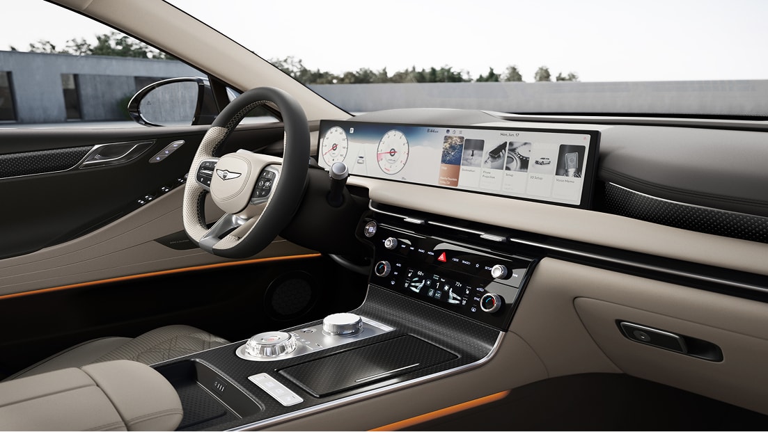 Genesis G80 interior with Ash Gray and Vanilla Beige leather, wide digital display and refined center console