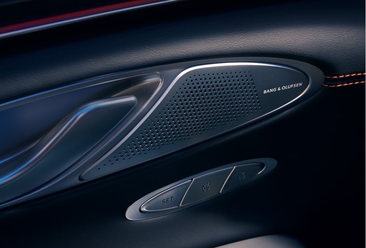 Listen to your favorite songs or podcasts on the Available Bang & Olufsen® Premium Audio system