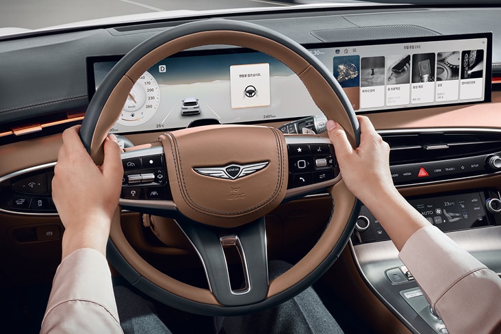 hands on a steering wheel