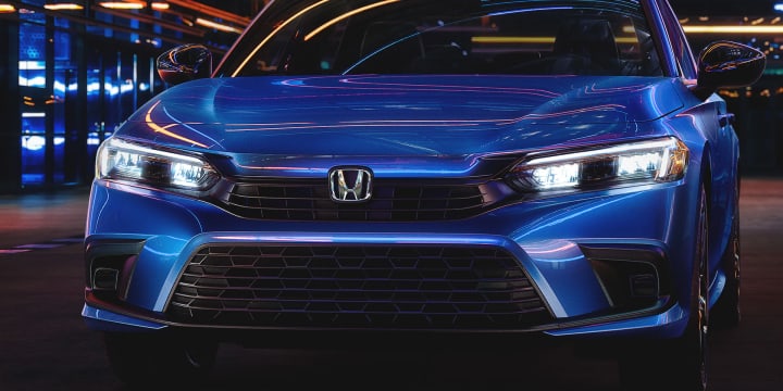 Front shot of blue 2023 Honda Civic Sedan