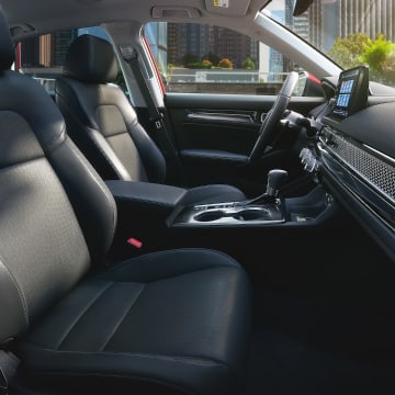 Honda Civic Sedan interior front row from side