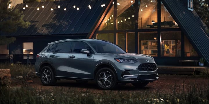 HR-V parked infront of cabin