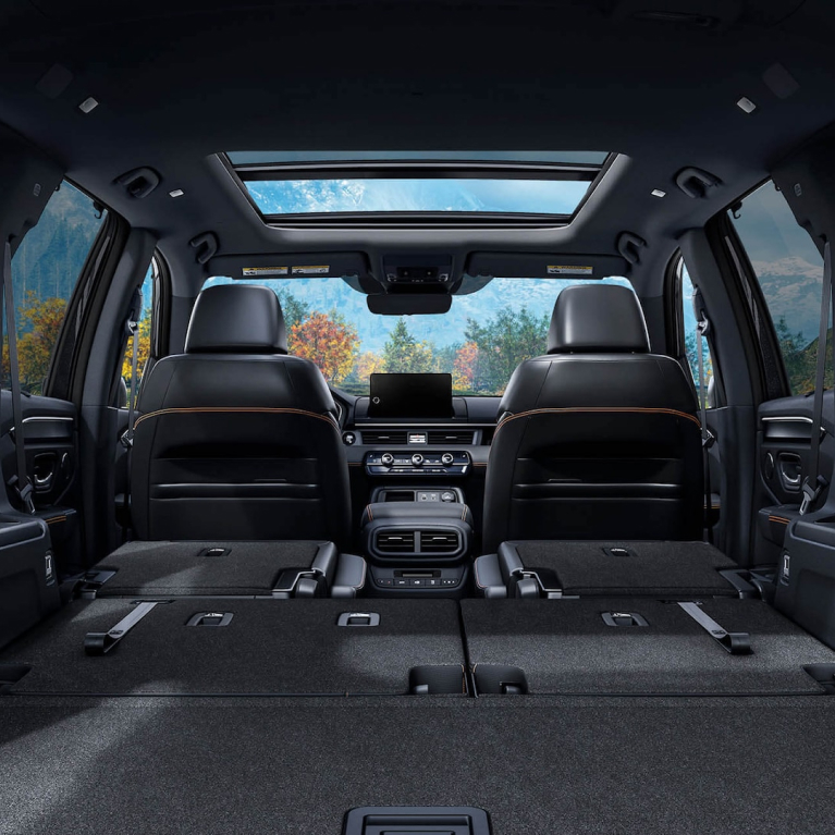 Interior shot of the trunk space with the middle and rear rows folded flat