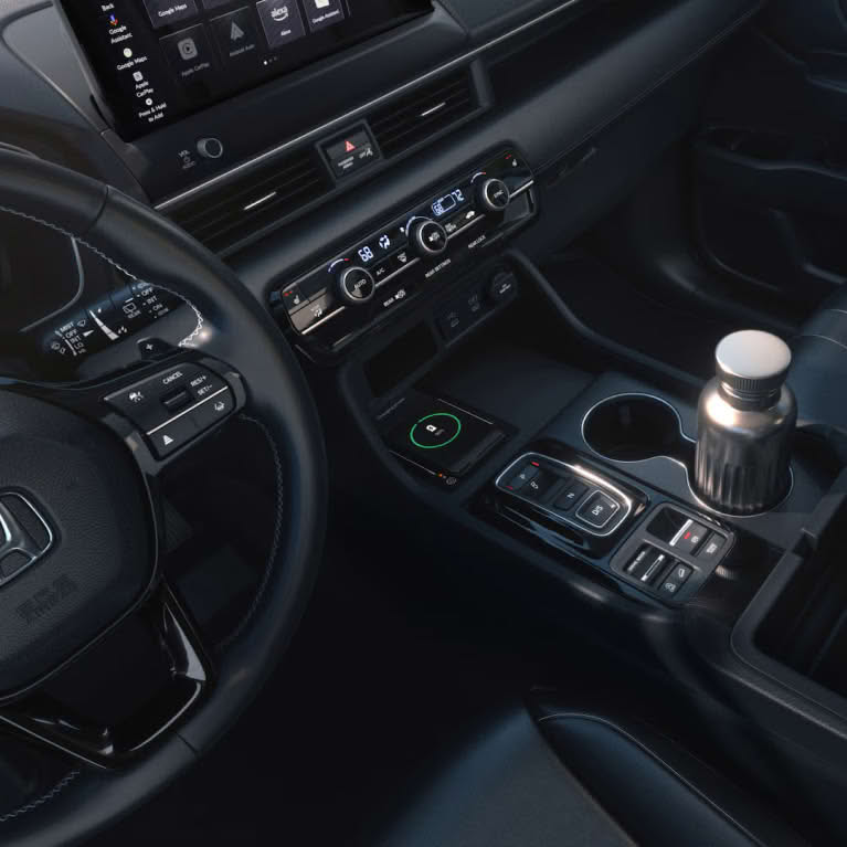 Close-up of center console phone charger