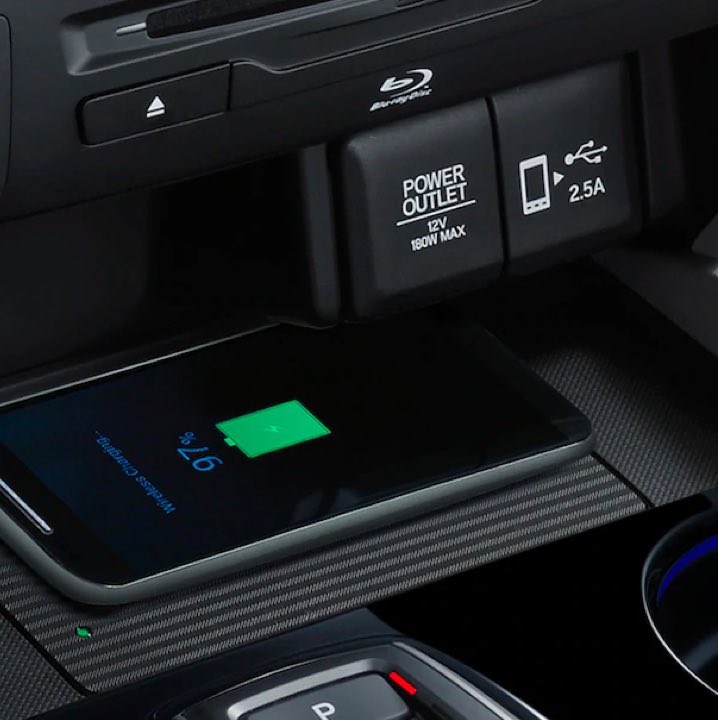 A shot of a phone charging inside the car