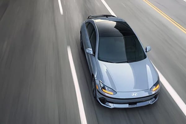 Hyundai EV driving on road