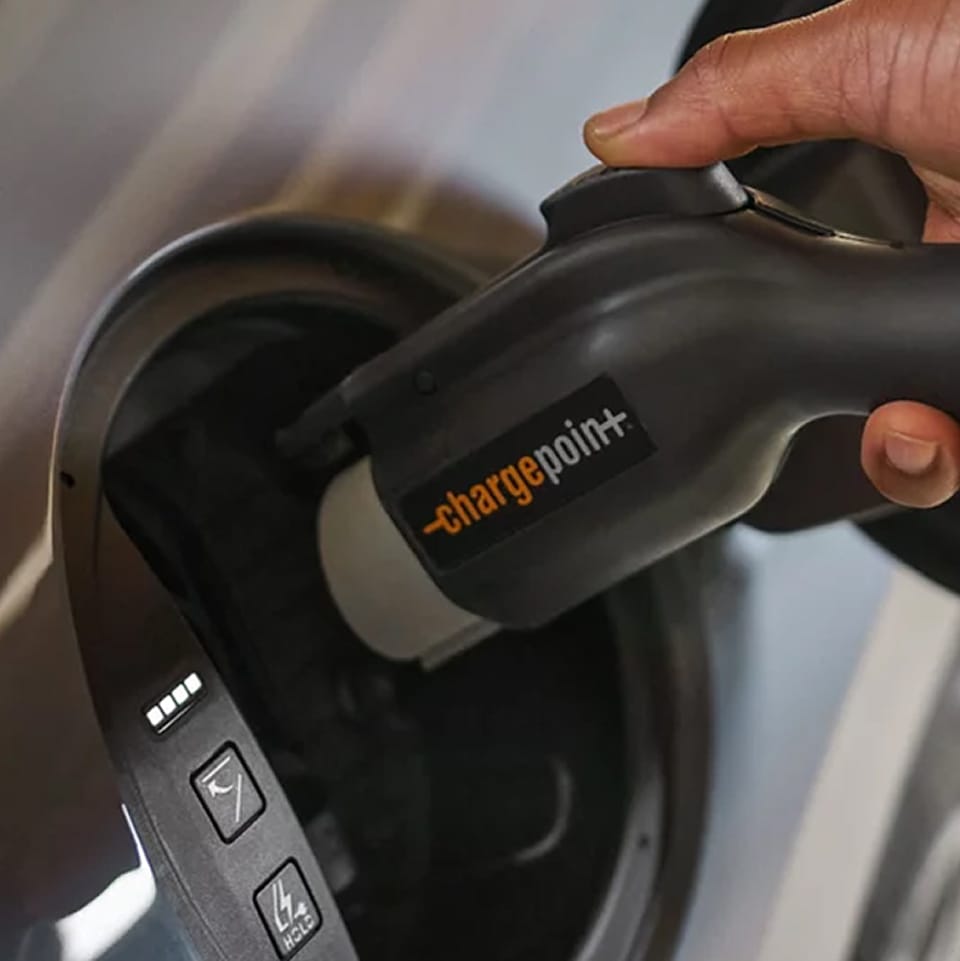 EV charge cable being plugged in