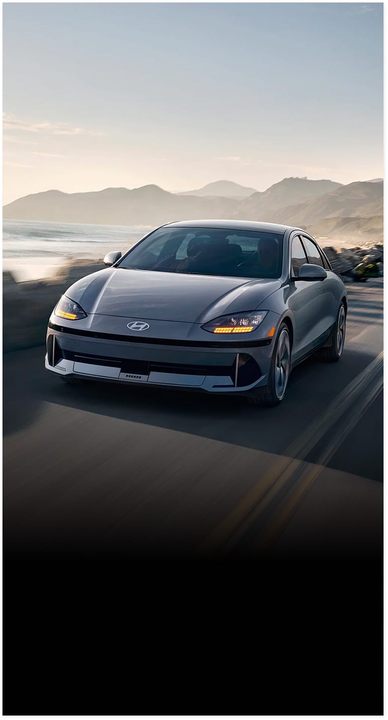 Hyundai EV driving on road