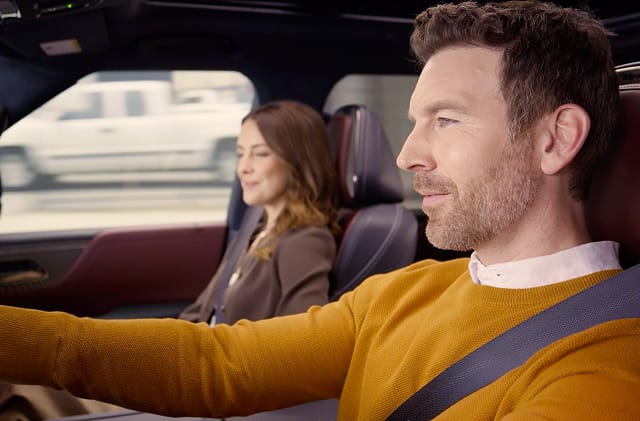 Couple in driver and passenger seats